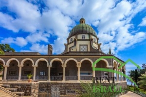 The majestic dome of the basilica is surrounded by a gallery with columns. Church Sermon on the Mount - Mount of Beatitudes. Sea of Galilee, Israel