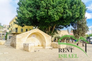 NAZARETH, ISRAEL - DECEMBER 16, 2015: Scene of Mary Well, with locals and tourists, in Nazareth, Israel